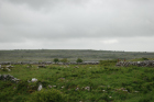 Karst pavements and topography of the Burren approx 5km south of Ballyvaughan Co Clare Ireland. Exposures of the Dinantian Burren Limestone Formation are composed of shallow water carbonates. Note the clints (limestone blocks) and grikes (joints formed by Variscan folding (Coller, 1984) and fracturing) enlarged by Pleistocene disolution (Williams, 1966).